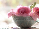 Delicate Roses in a Cup