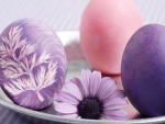 Easter eggs and purple flowers