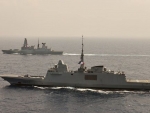 WORLD OF WARSHIPS French Navy FREMM frigate Provence (foreground) exercising with HMS Defender British Type 45 Destroyer (background)