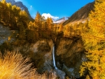Waterfall in Autumn Mountains