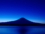 Blue volcano at nightfall
