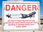 Maho Beach Warning Signs
