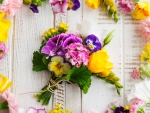 Spring flowers on wooden table