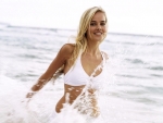 Isabelle Lucas in the surf