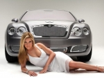 Blonde model with her Bentley