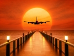 Airplane Takeoff During Sunset