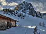 Cabin in the Mountains in Winter Time
