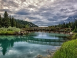 Wooden Bridge Above The Lake