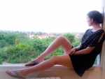 Deniz with short skirt, looking outside