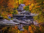 Mill in autumn forest