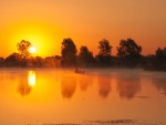 Boat on the Water at Dawn