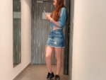 Deniz with short denim skirt in hotel room