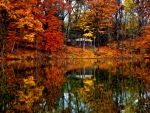   House Standing on the Shore of a Lake