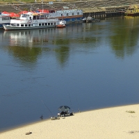 Vistula River, a beach and a riverboat natural colors