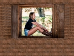 Cowgirl In A Barn Window