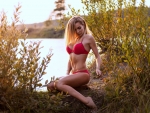 Model Posing in a Red Bikini