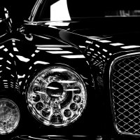 Headlamps of black Bentley
