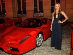 Ellen Hollman with three Ferrari's