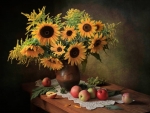 Still life with sunflowers and apples