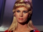 Grace Lee Whitney as Yeoman Janice Rand.