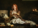 Red haired girl with a book