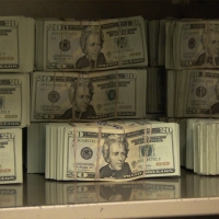Bundles of$20's in my safe.