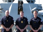 Three Submariners aboard HMS Portland