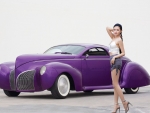 Model Posing with a Purple Hot Rod