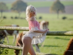 Sexy Blonde Checking out the Cows