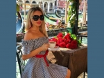 Enjoying her coffee in Venice
