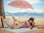 Asian Beauty Enjoying a day at the Beach