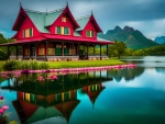 Red house on the shore of a lake