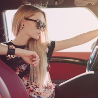 Model behind the wheel