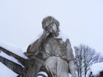 Snow covered statue