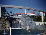 Old Red Monorail Going Over the Falls