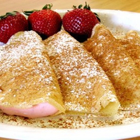 Pancakes with a strawberry