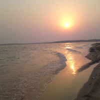 sunset at khor aladeed beach