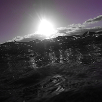 Wave overpowering the Sun