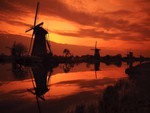 windmills at sunset