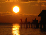 fishing at sunset