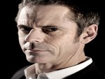 C.THOMAS HOWELL