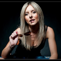 blonde girl with glasses