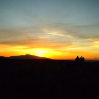 Trampers sunset by Tongariro