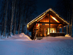 Winter Cabin at Night