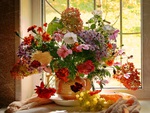 Window with flowers in summer