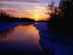 Partly Frozen River at Dusk